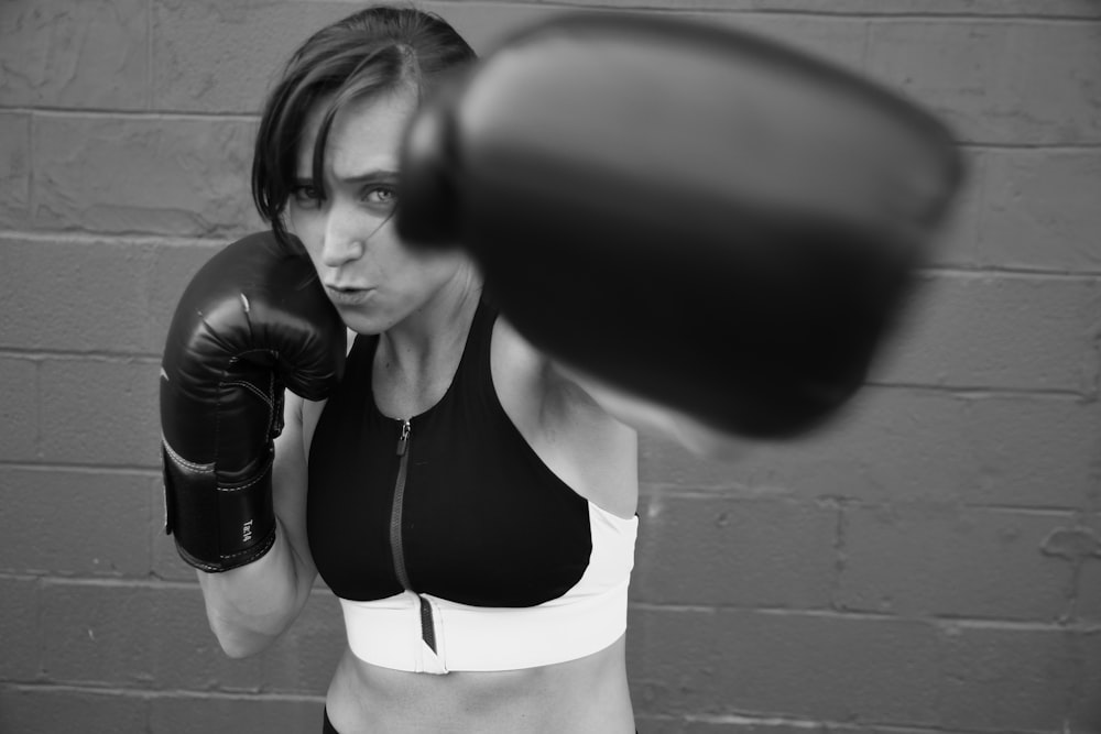 woman in black sports bra and white panty