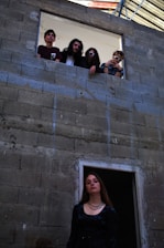 A candid photo of the La Dent Creuse collective members collaborating in an urban vacant space in Brest.