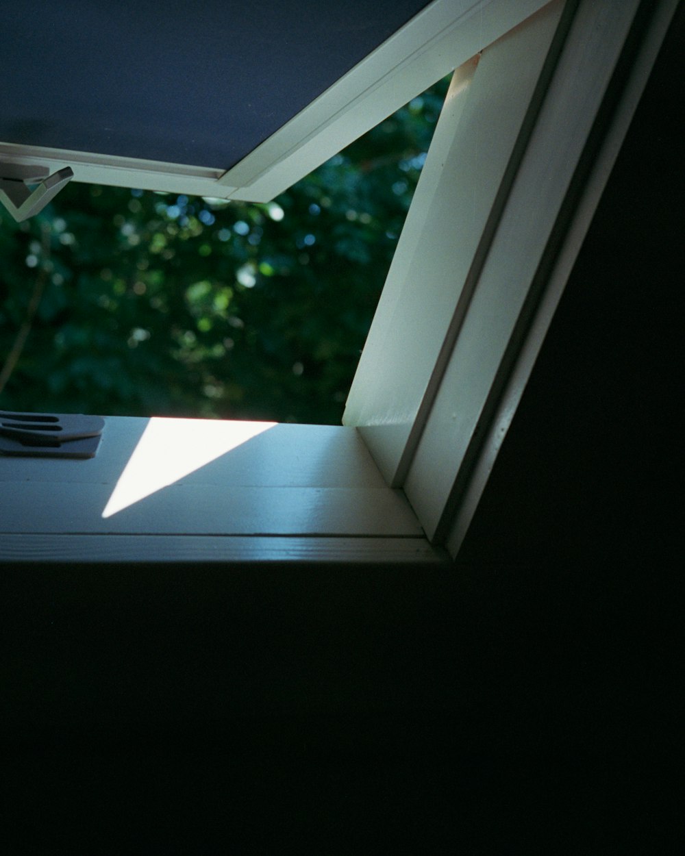 white wooden framed glass window