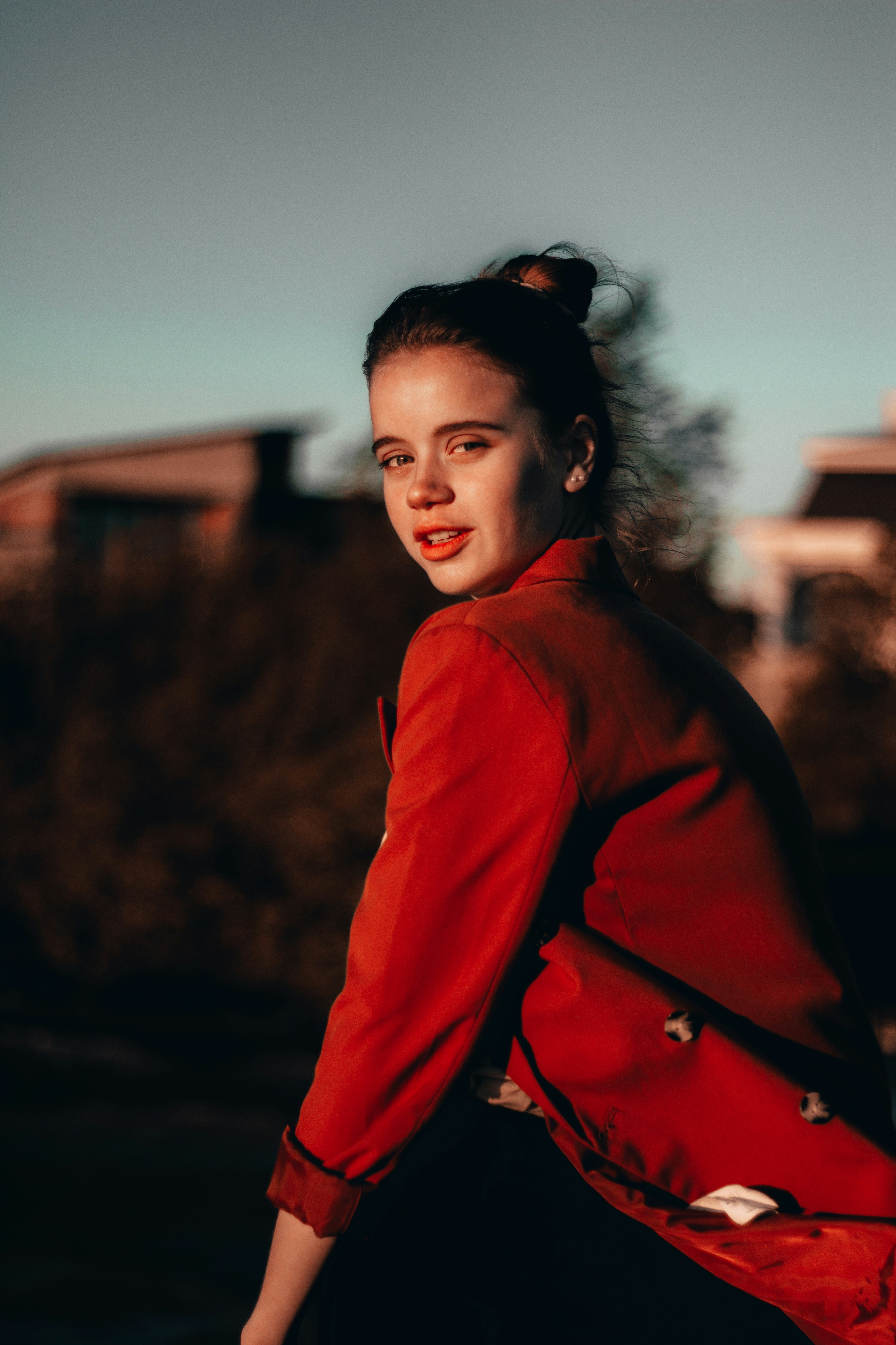 woman in red long sleeve shirt
