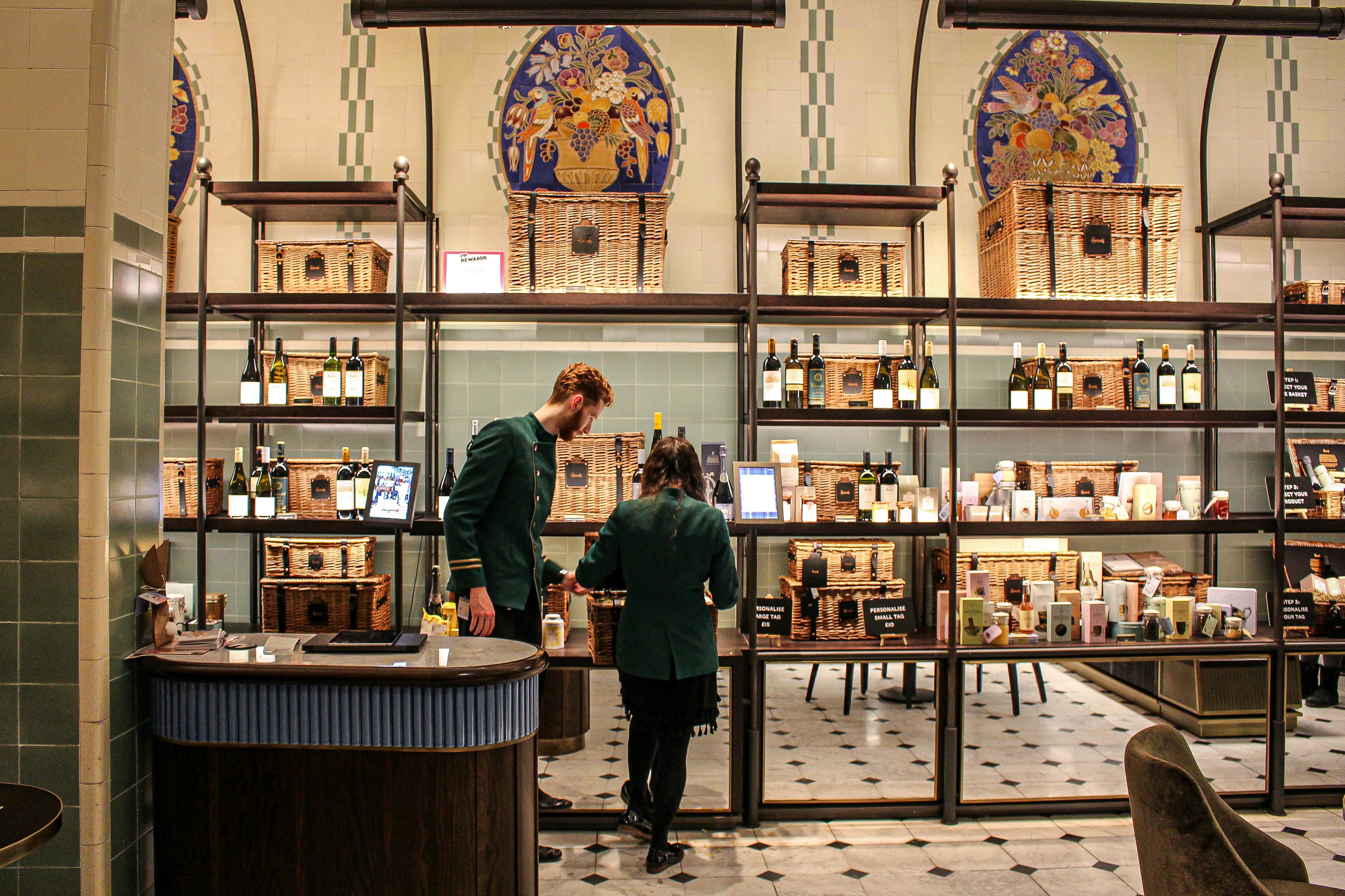 man in green long sleeve shirt standing beside man in green long sleeve shirt