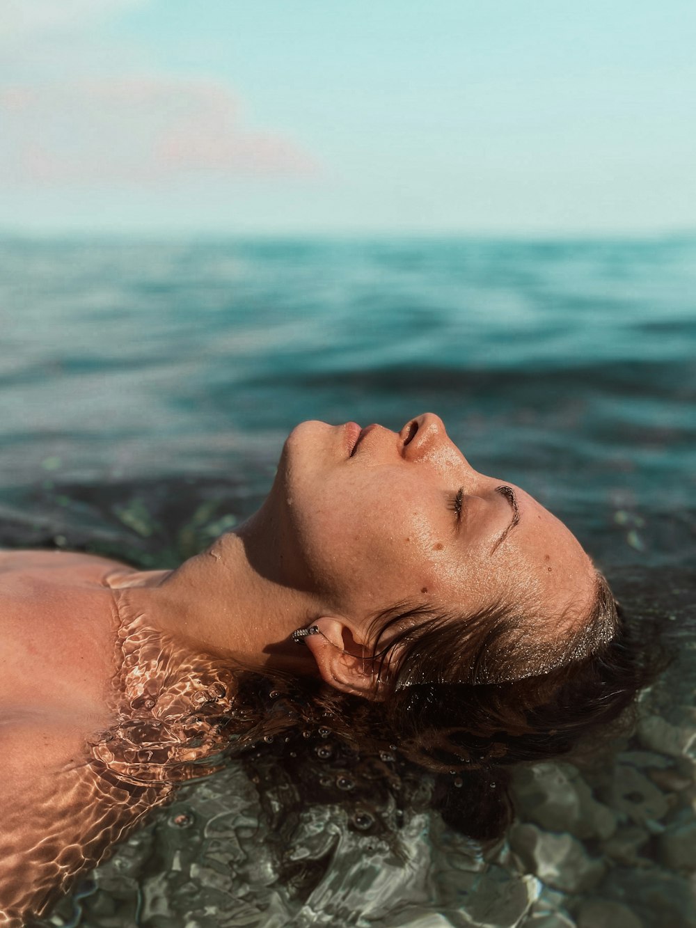 woman in water during daytime