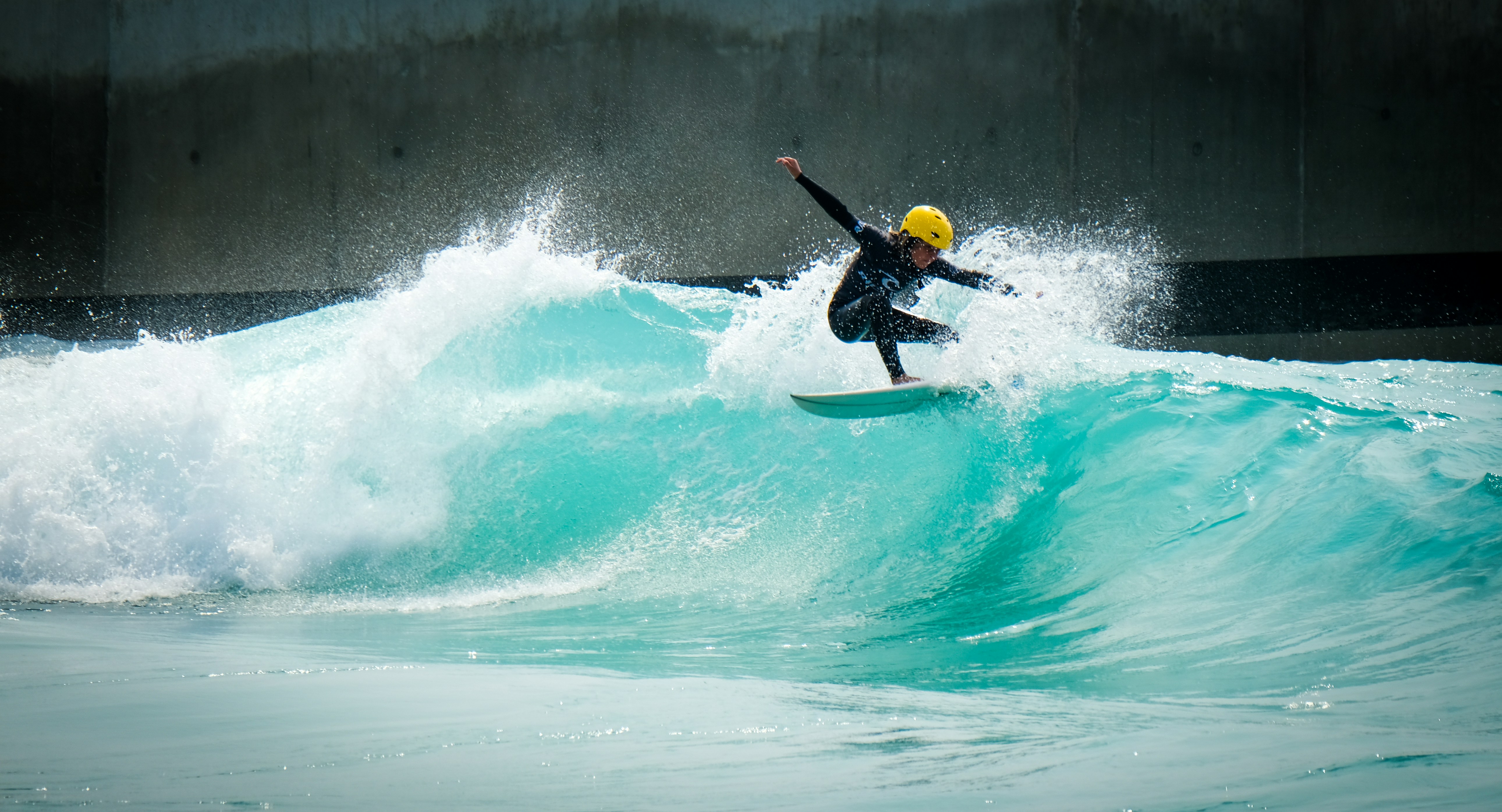 Photo of grom boy kid surfer, surfing the surf in Bristol at The Wave wavepool.
