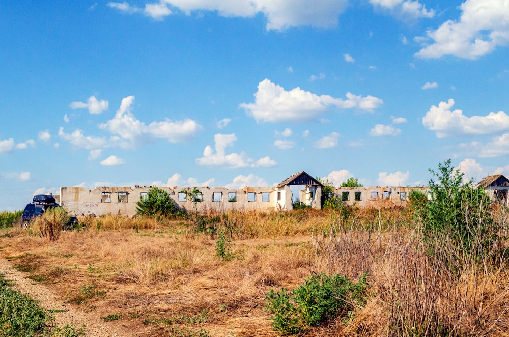 white and brown houses under blue sky during daytime