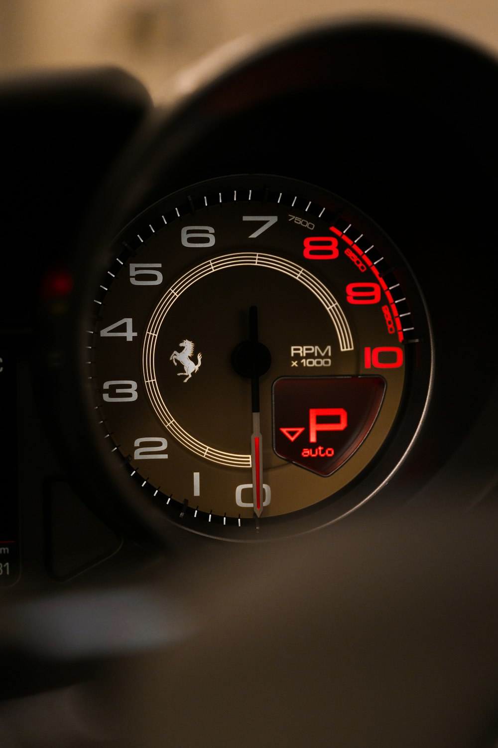 black and red analog speedometer