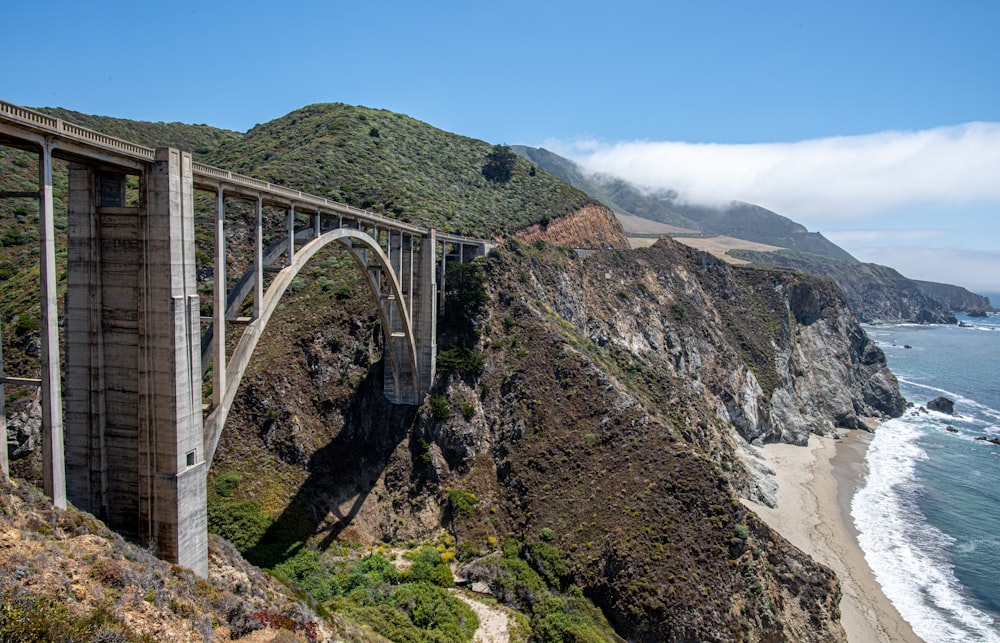 gray metal bridge over the river