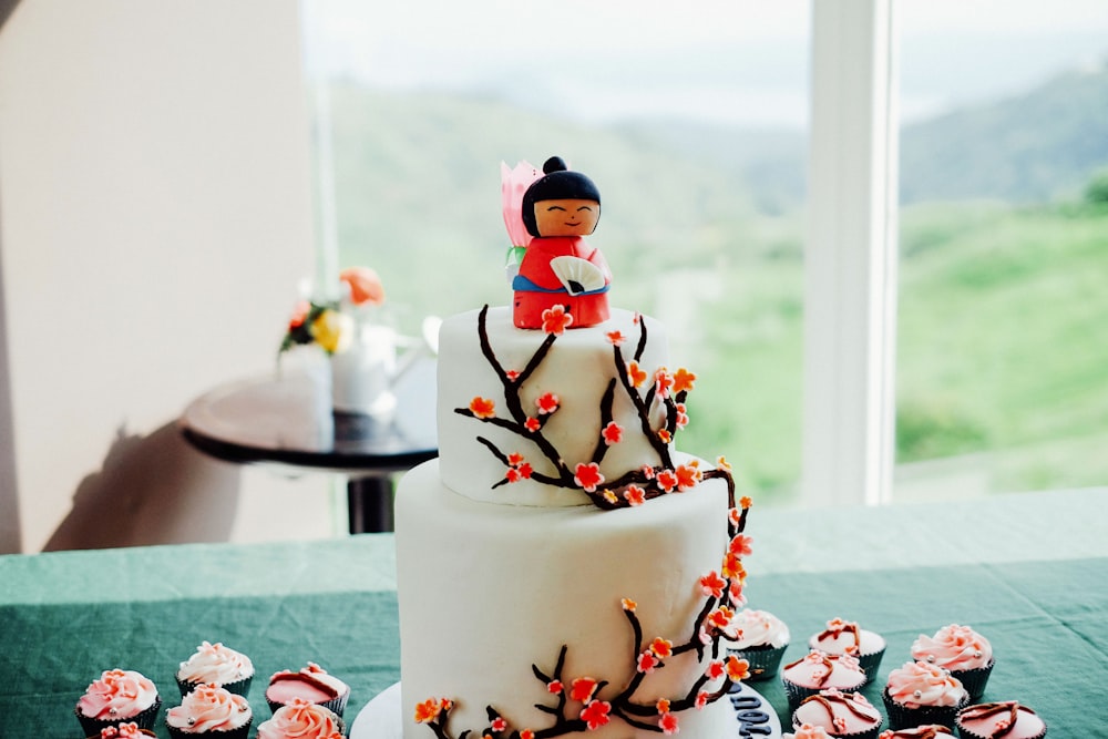 white and red snowman cake