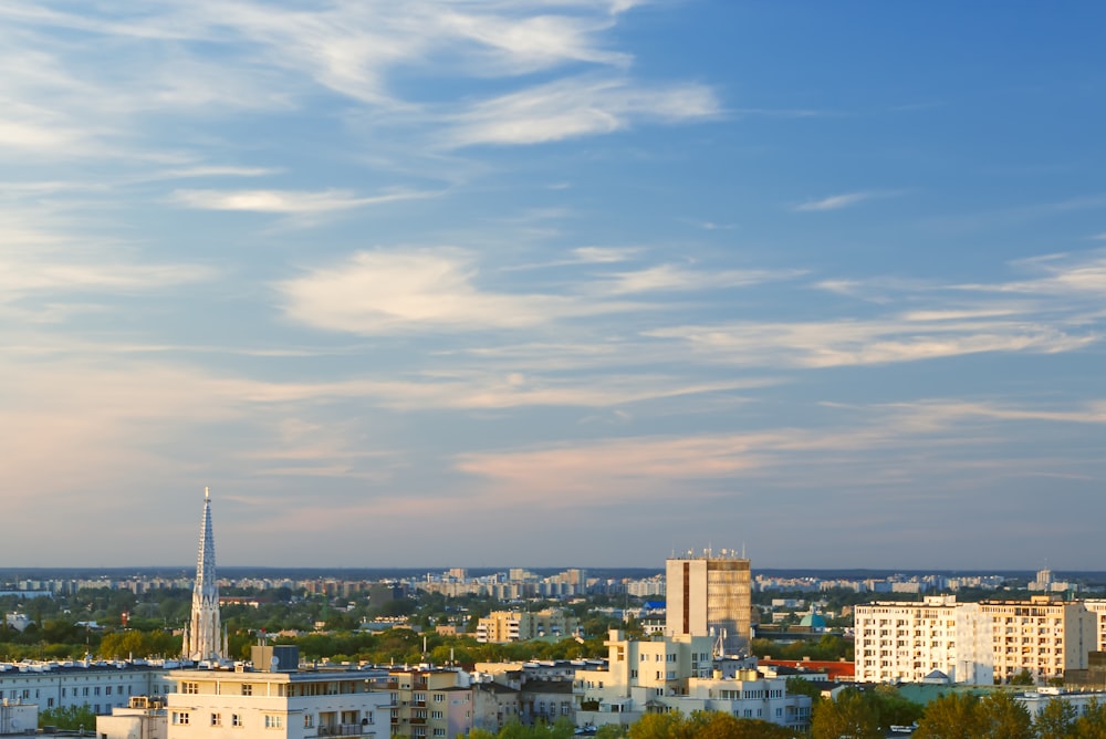 a view of a city with tall buildings