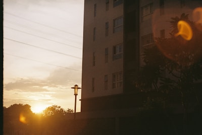 Wide-angle shot of a completed project glowing under sunset light.