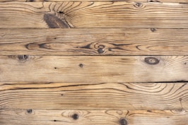 brown wooden plank in close up photography