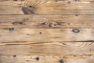 brown wooden plank in close up photography