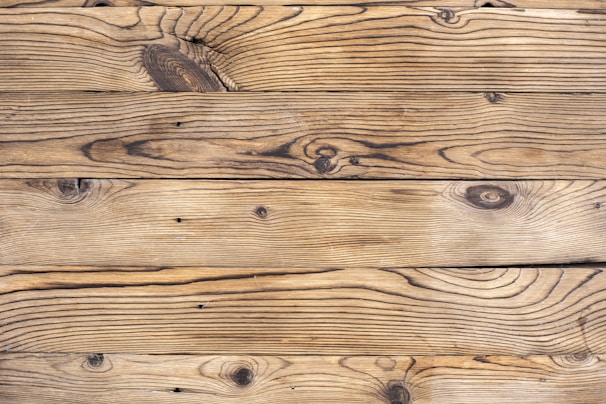 brown wooden plank in close up photography