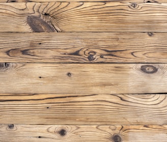 brown wooden plank in close up photography