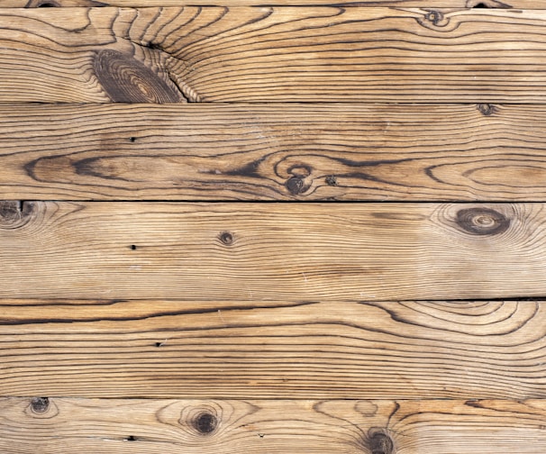 brown wooden plank in close up photography