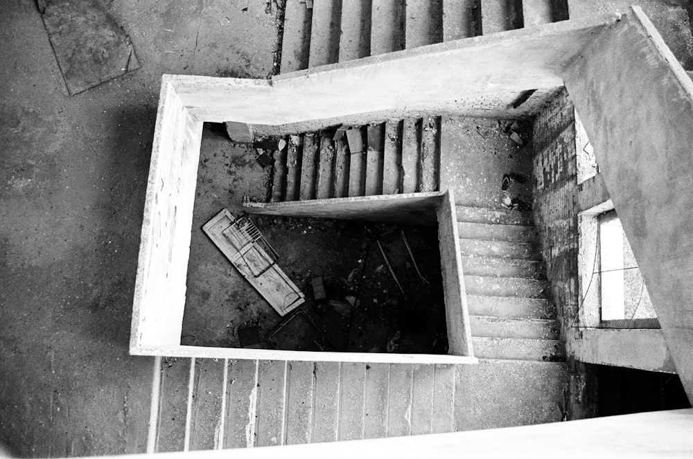 grayscale photo of wooden stairs