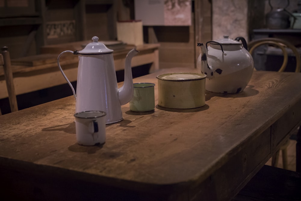 white ceramic teapot on table