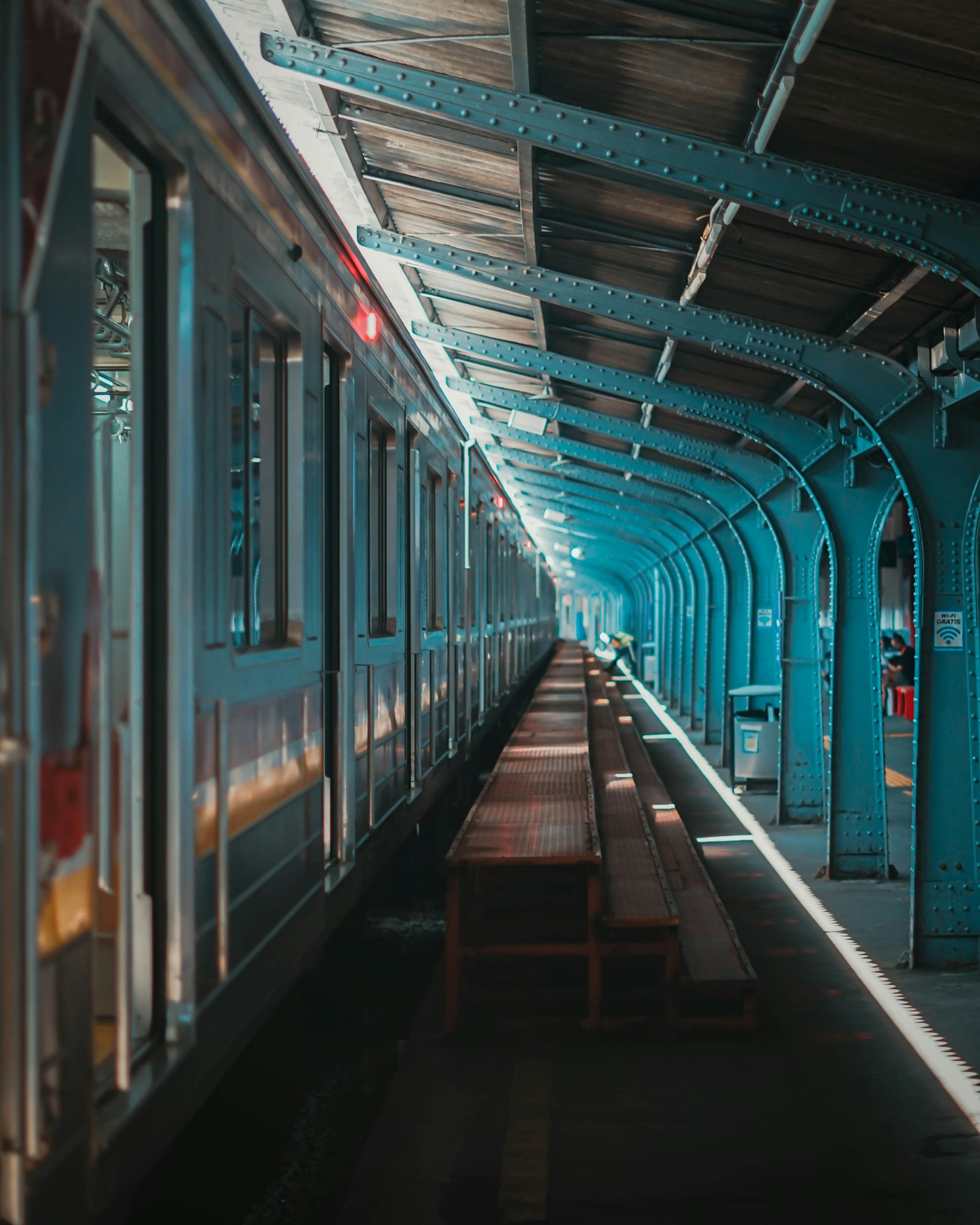 Sony a7 + Sony FE 50mm F1.8 sample photo. Blue and brown train photography