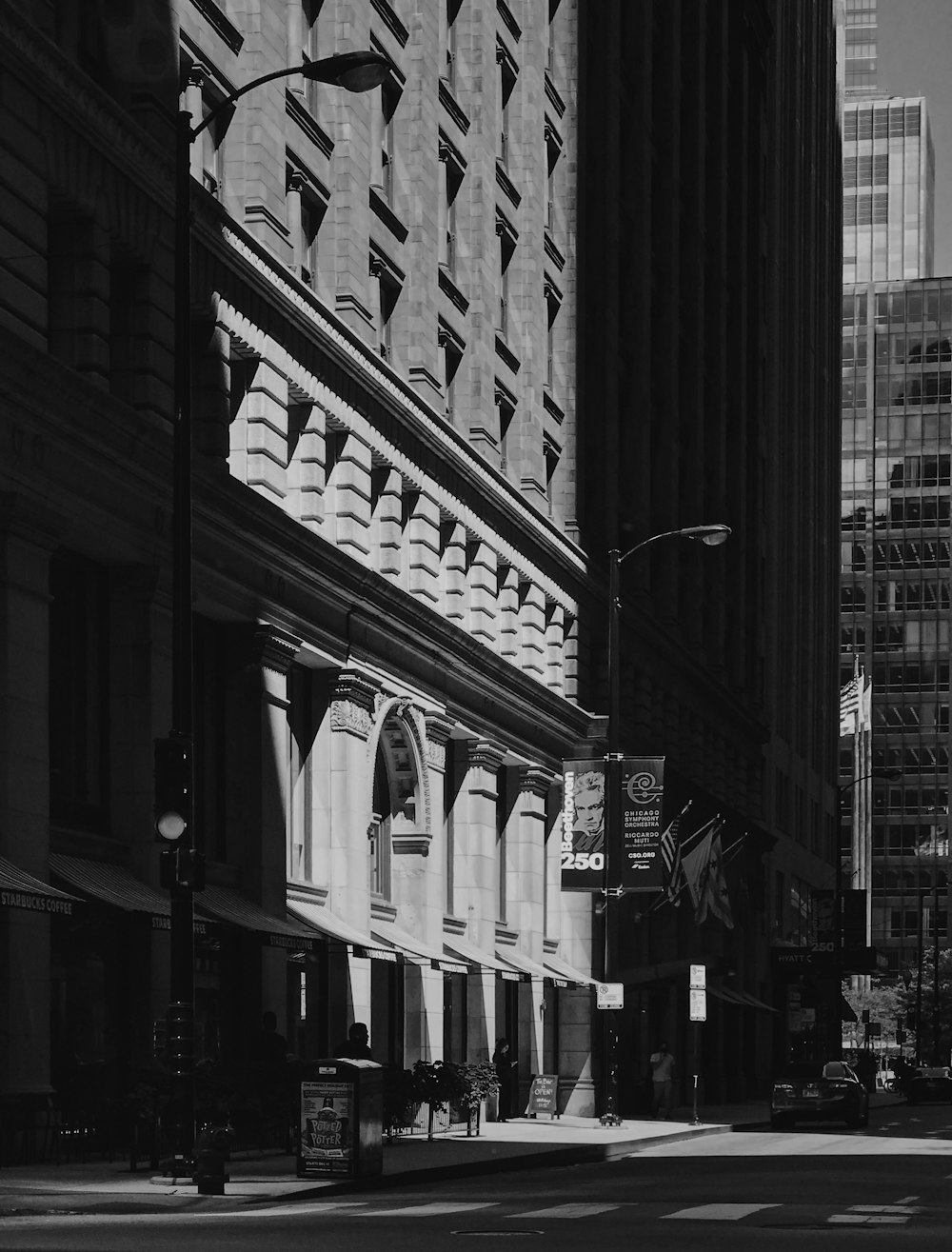 grayscale photo of people walking on street