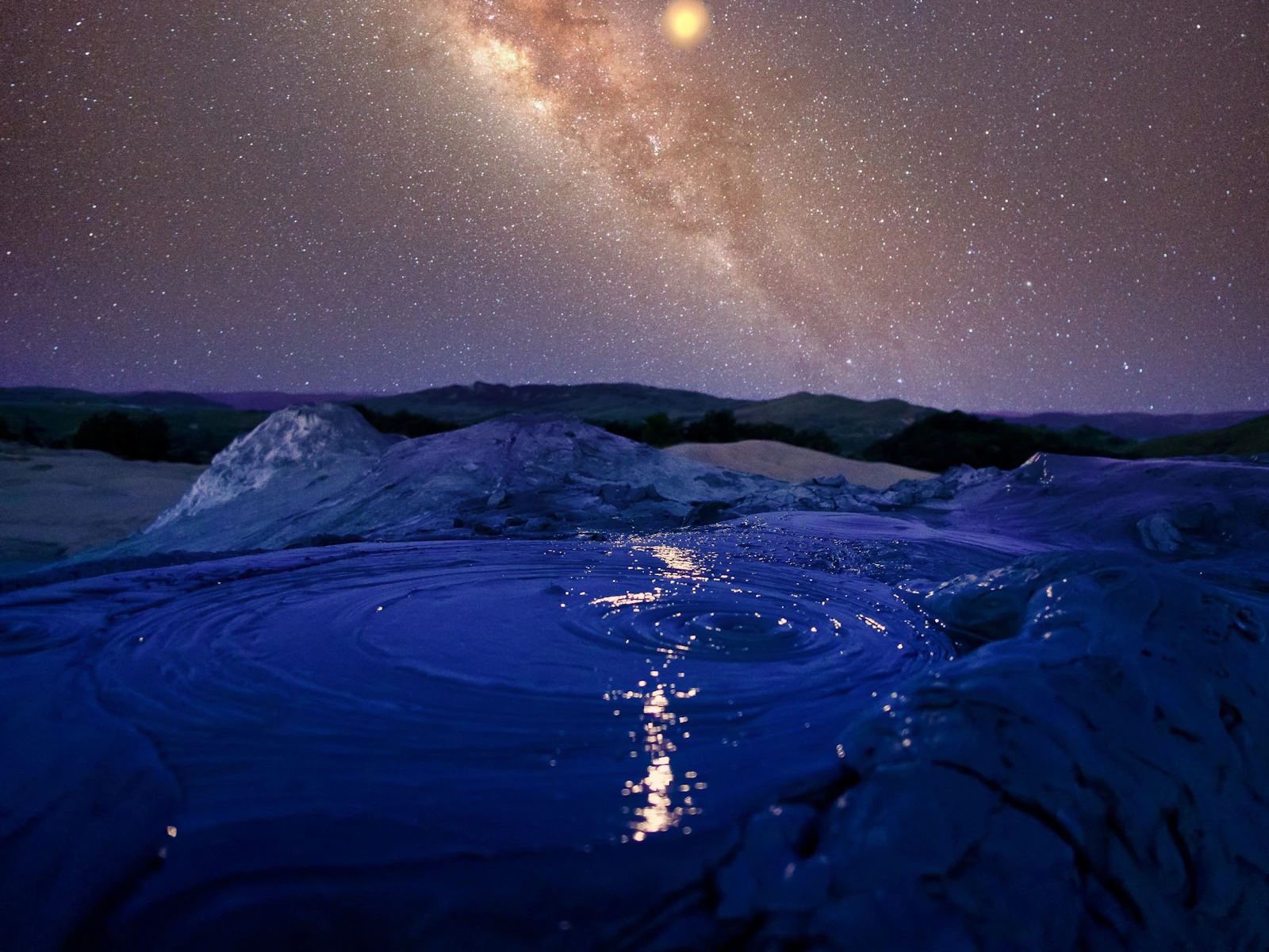 Glowing aurora borealis lights up the night sky, offering a glimpse of the boundless beauty and mystery of the cosmos