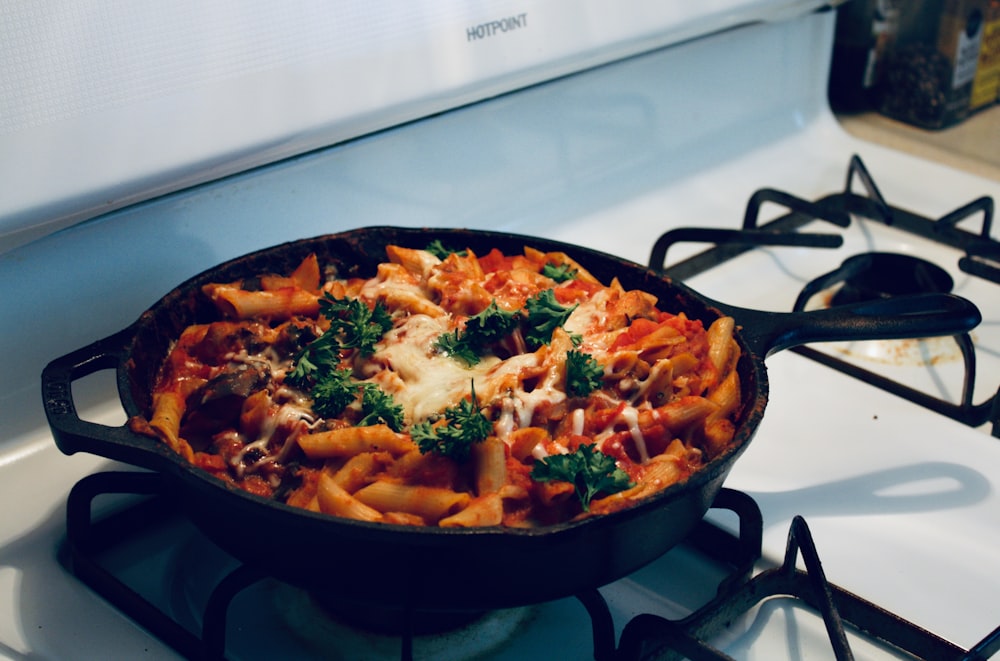 cooked food on black frying pan