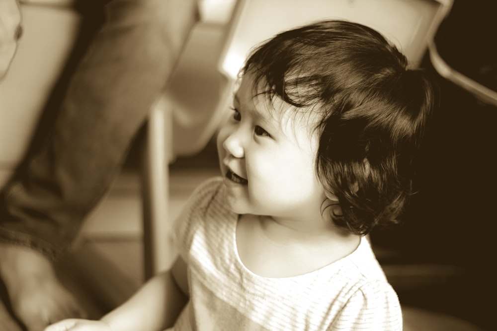 grayscale photo of girl in tank top