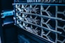 a close up of a server's nameplates on the side of a