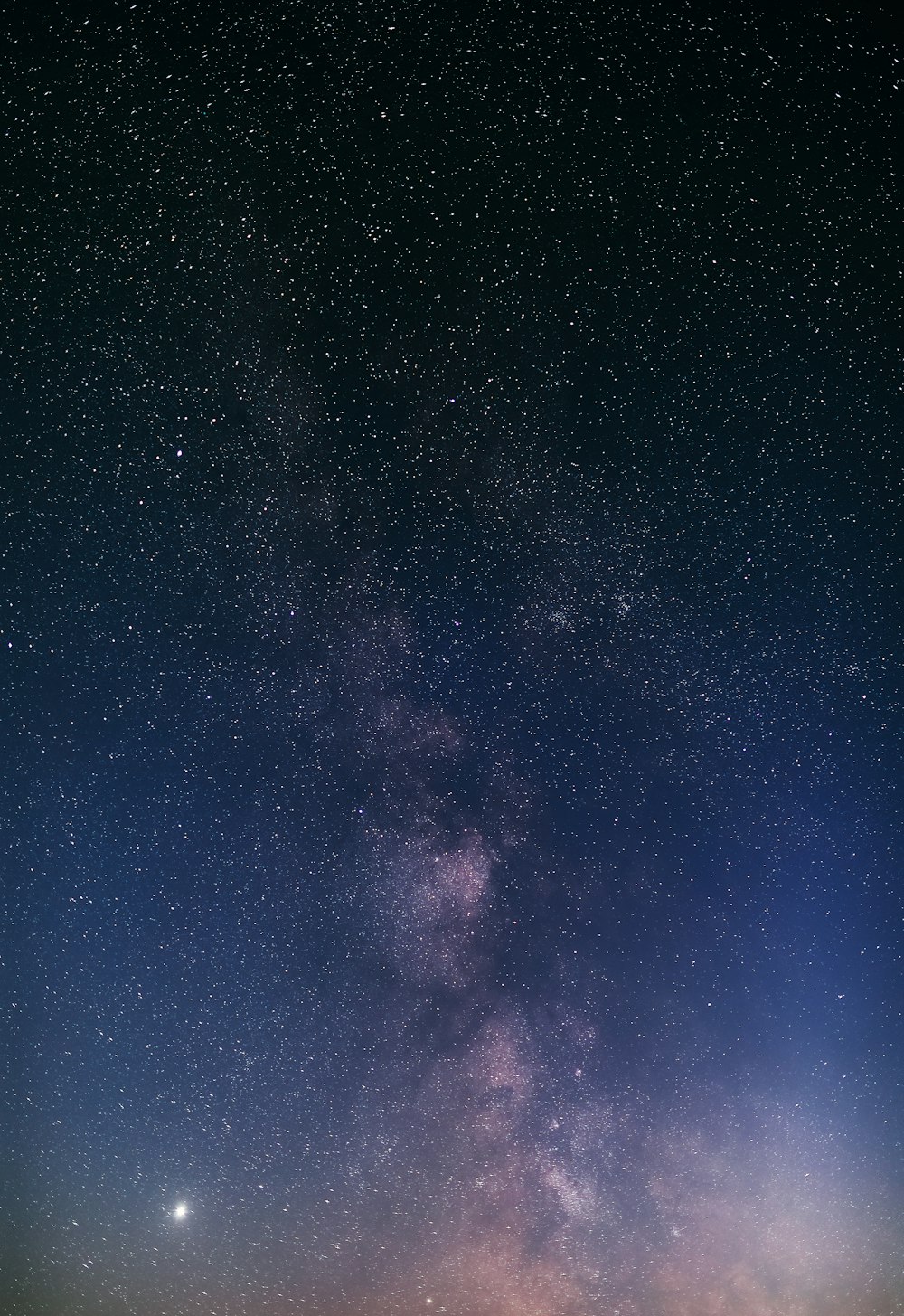 blue sky with stars during night time