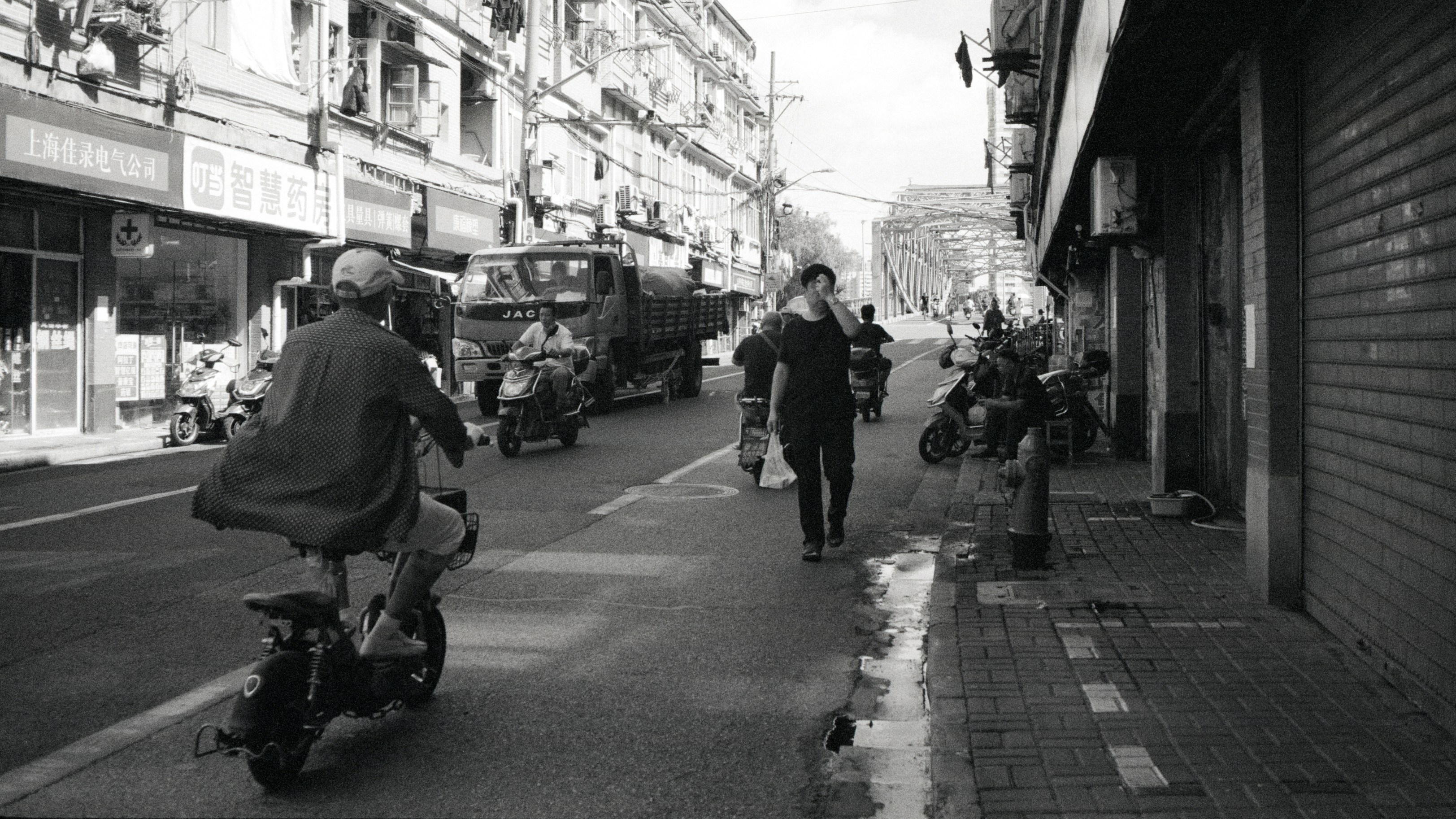 people walking on sidewalk during daytime