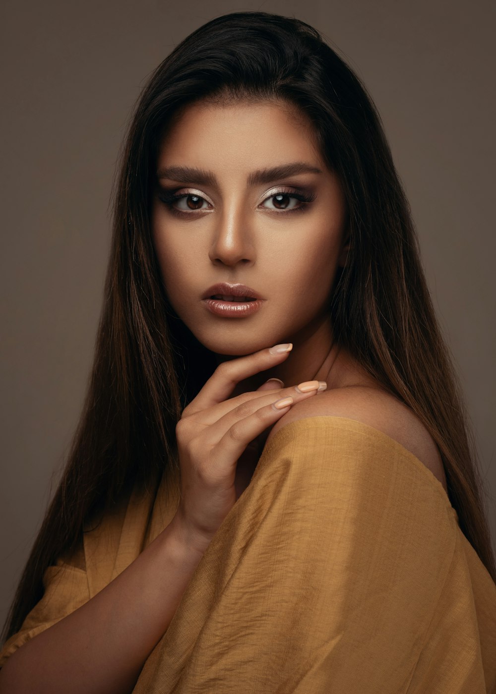 woman in brown long sleeve shirt