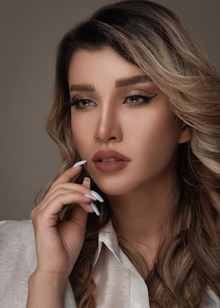 woman in white long sleeve shirt