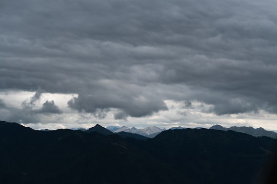 black mountains under gray clouds in Flachau Austria