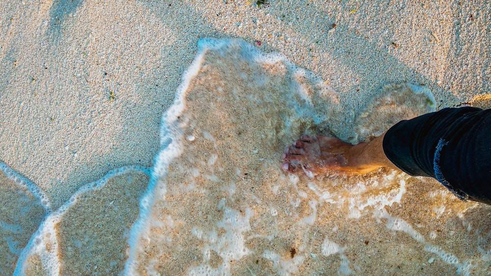 brown and white sand on beach