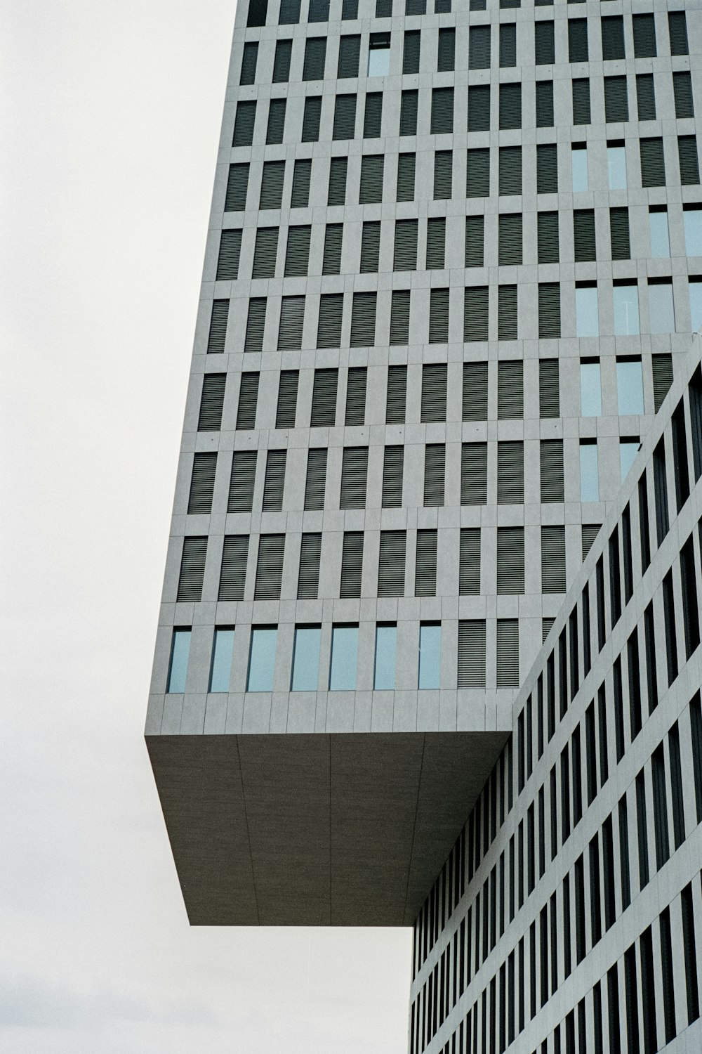 a very tall building with a clock on it's side