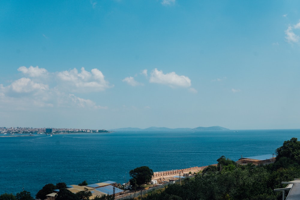 a view of a body of water from a hill