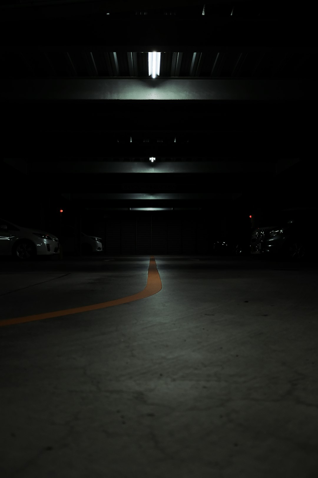 cars parked on parking lot during night time