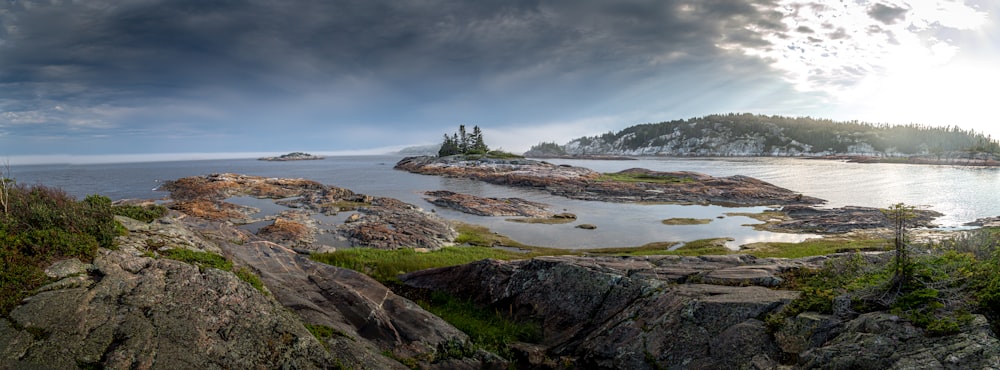 a large body of water surrounded by rocks