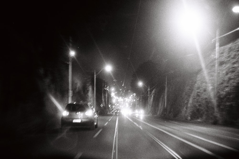 car on road during night time