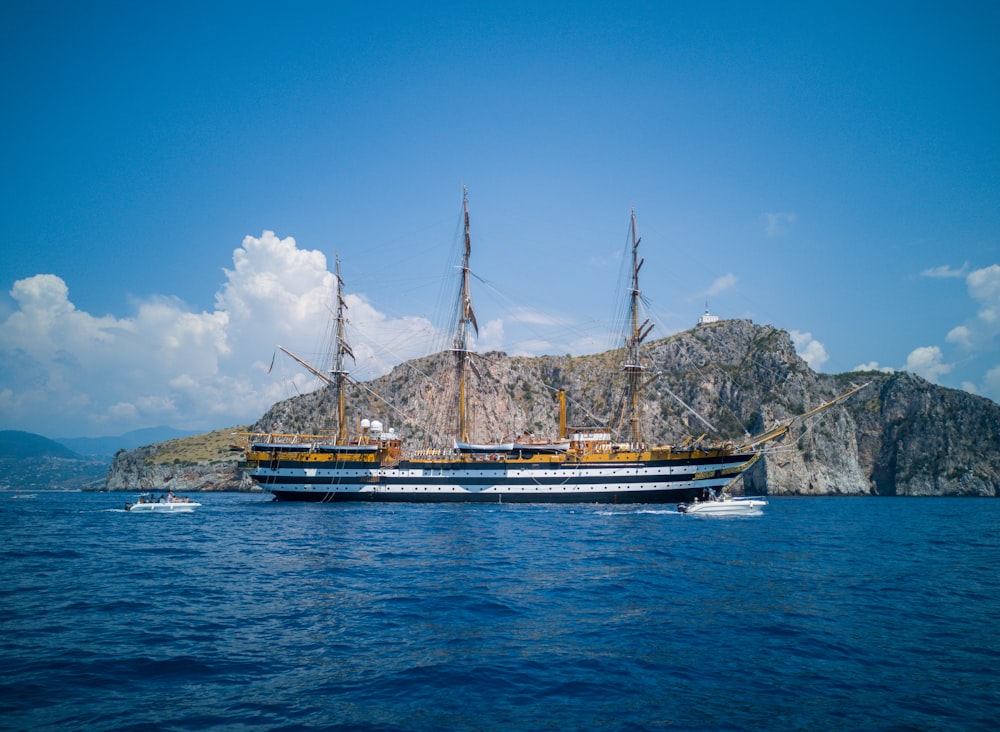 black and brown boat on sea during daytime