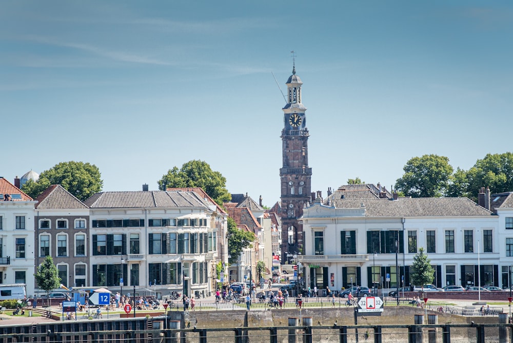 a tall clock tower towering over a city