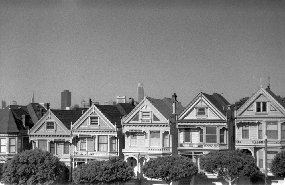 grayscale photo of 2 storey house