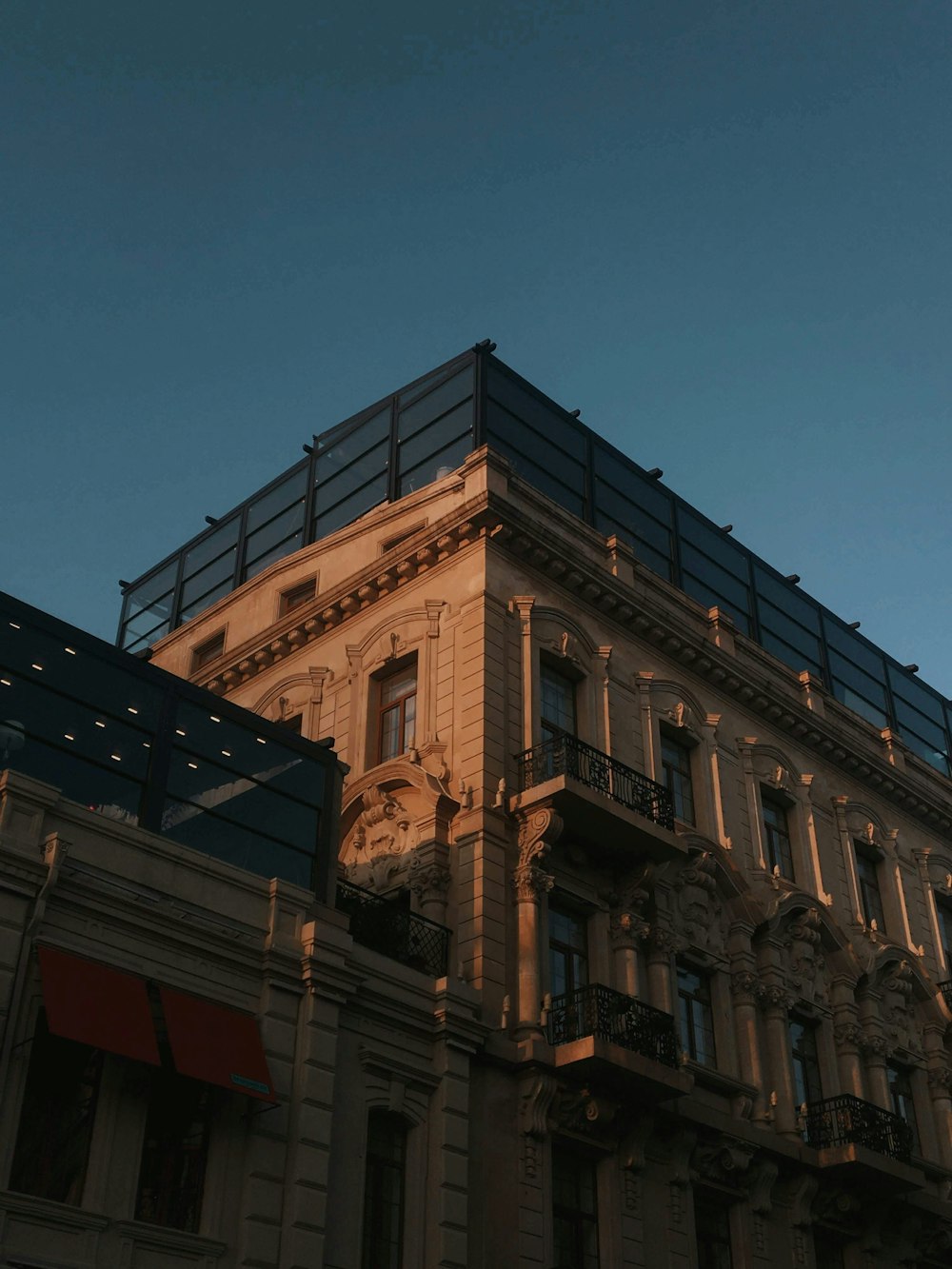 brown concrete building under blue sky during daytime