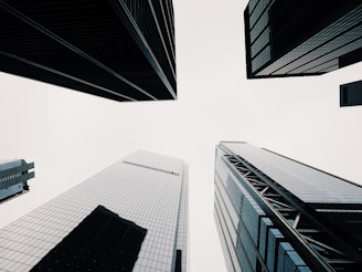 low angle photography of high rise buildings