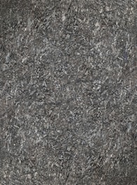 Image showing a close-up of cold milling equipment grinding asphalt on a busy road.