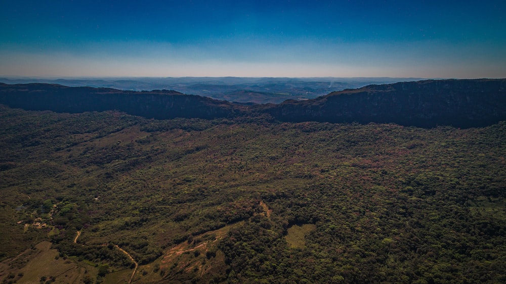 green and brown mountains under blue sky during daytime