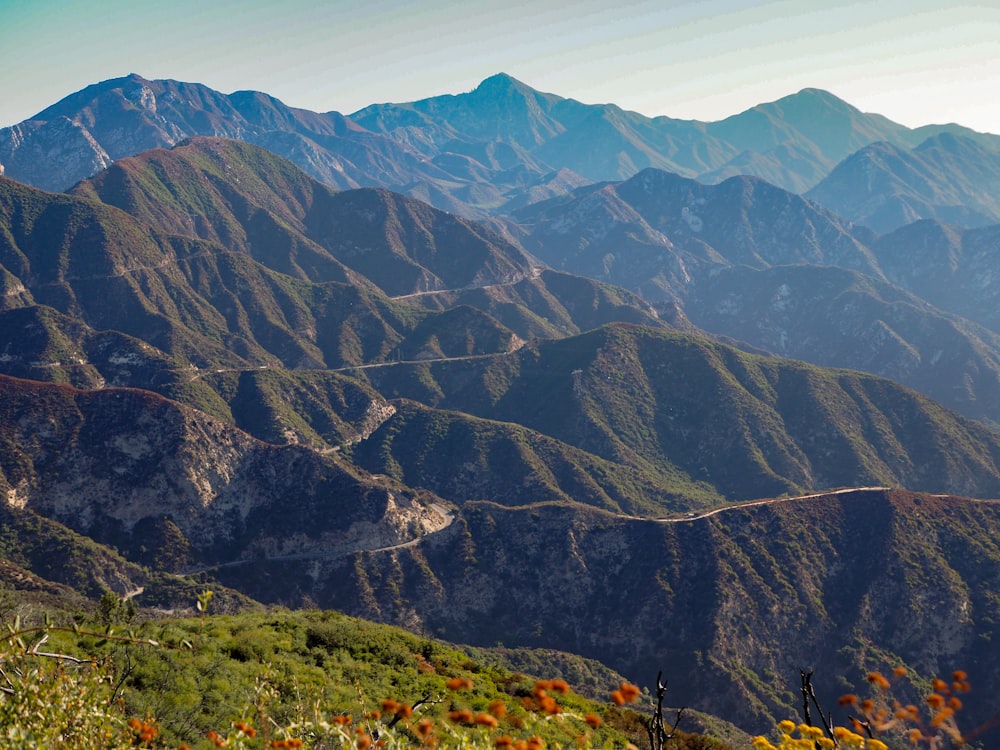 green and brown mountains under blue sky during daytime