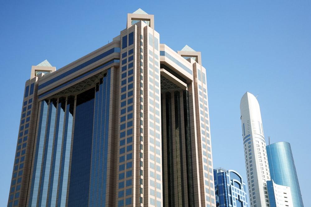 white concrete building under blue sky during daytime