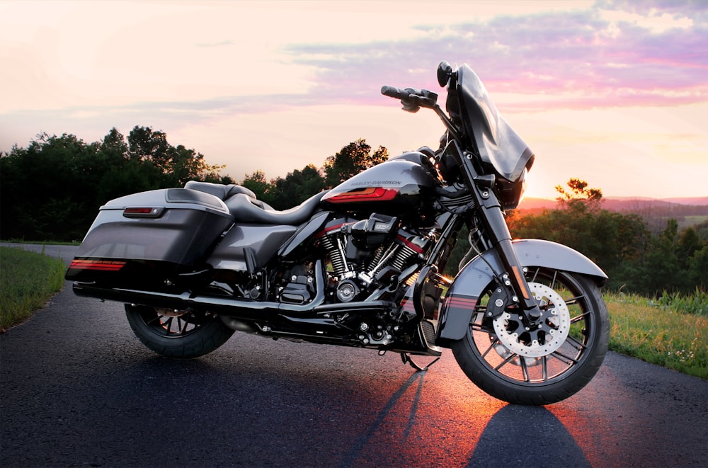 black and silver cruiser motorcycle on road during daytime