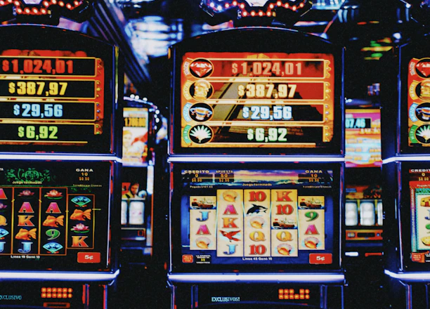 A vibrant online casino interface showcasing colorful slot machines and bonus icons.
