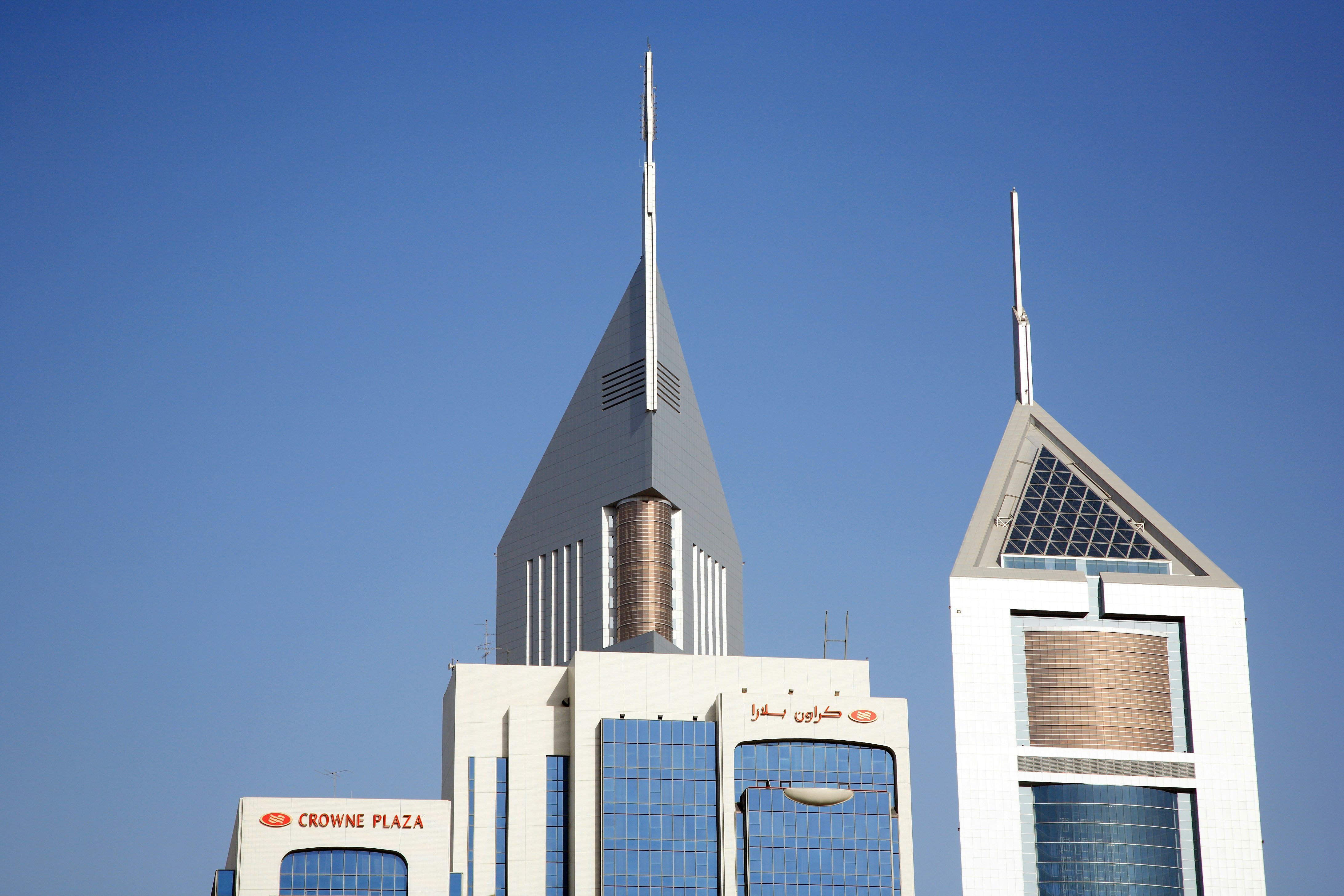 white concrete building under blue sky during daytime