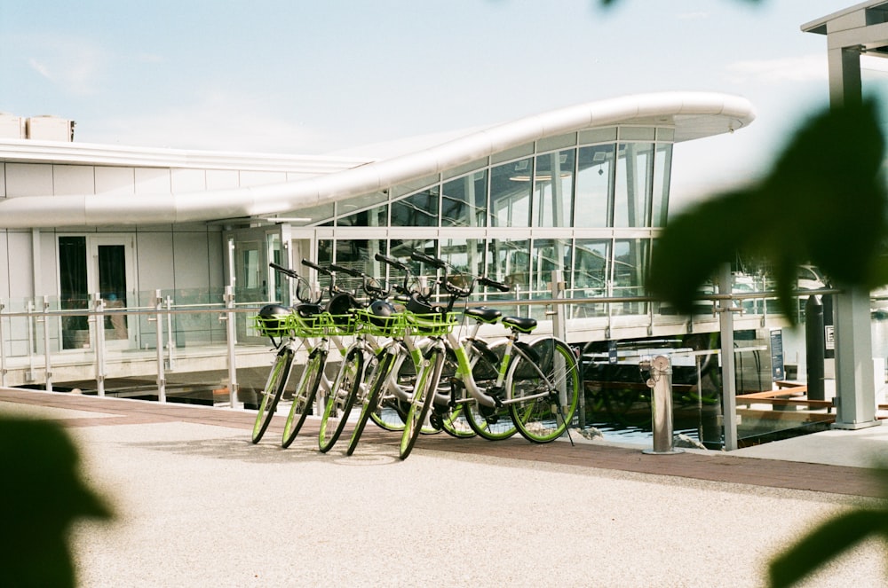 black and gray bicycle parked on gray concrete floor during daytime